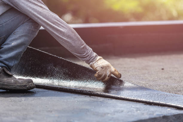 Professional Basement Waterproofing technician working in Smithville, NJ